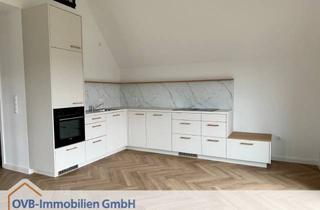 Wohnung kaufen in 26789 Leer, Vermietete Eigentumswohnung mit Balkon und Studio