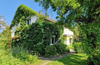 Einfamilienhaus kaufen in 44359 Dortmund, Attraktives Wohnhaus mit Einliegerwohnung in idyllischer, grüner Lage.