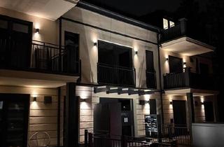 Wohnung kaufen in 85757 Karlsfeld, Karlsfeld - Moderne Neubauwohnung (2023) mit Balkon & Tiefgarage - 60 m²