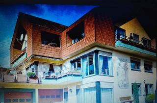 Haus kaufen in 36284 Hohenroda, Hohenroda - Zweifamilienhaus mit großer Garagenhalle.