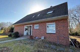 Wohnung kaufen in 24811 Owschlag, Owschlag: Helle Dachgeschosswohnung mit Charme, Gartenidylle & Garage in ruhiger Wohnlage