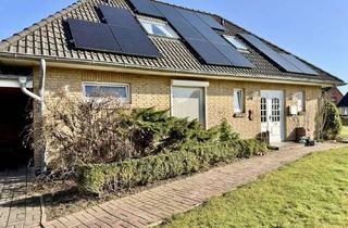 Einfamilienhaus kaufen in 25764 Wesselburen, Familienfreundliches Einfamilienhaus mit PV-Anlage, Wärmepumpe & Garten