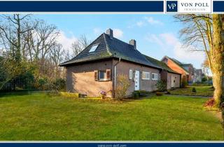 Einfamilienhaus kaufen in 46499 Hamminkeln, Charmantes freistehendes Einfamilienhaus mit angebauter separater Wohneinheit im Grünen