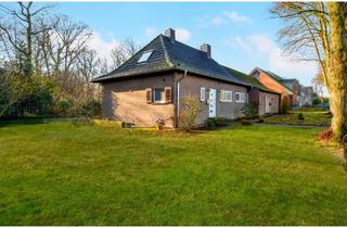 Einfamilienhaus kaufen in 46499 Hamminkeln, Charmantes freistehendes Einfamilienhaus mit angebauter separater Wohneinheit im Grünen