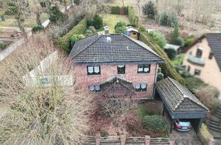 Einfamilienhaus kaufen in Wilkestr. 14, 58809 Neuenrade, Wohnen am Waldrand: Einfamilienhaus mit 132 m² Wohnfläche, großer Garage und Kaufgrundstück !!!!