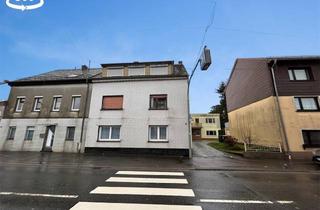 Einfamilienhaus kaufen in 66589 Merchweiler, Dreifamilienhaus mit angebautem Einfamilienhaus - Garten und 2 Garagen