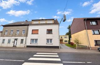 Einfamilienhaus kaufen in 66589 Merchweiler, Dreifamilienhaus mit angebautem Einfamilienhaus - Garten und 2 Garagen