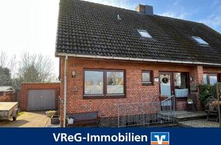 Doppelhaushälfte kaufen in 25582 Kaaks, Familienfreundliches Zuhause mit Garage in idyllischer Dorflage