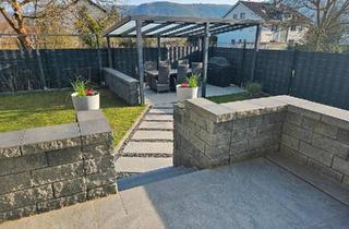 Wohnung kaufen in 63897 Miltenberg, Miltenberg - Eigentumswohnung mit Garten und 2 Garagen zu verkaufen