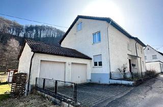 Mehrfamilienhaus kaufen in 72574 Bad Urach, Bad Urach - 2-3 Mehrfamilienhaus mit Garten, Garagen, Balkon zu verkaufen