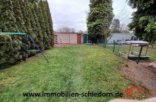 Wohnung kaufen in 46149 Schwarze Heide, Erdgeschoss-Maisonettewohnung mit Terrasse, Garten und Garage in Oberhausen Schwarze Heide