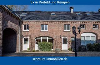 Wohnung kaufen in 47918 Tönisvorst, Wohnen wie im Haus: Exklusive Wohnung mit Garage in naturnaher historischer Hofanlage in St. Tönis