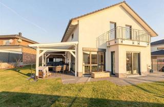 Einfamilienhaus kaufen in Spatzenring 37, 38479 Tappenbeck, Modernes, energieeffizientes Einfamilienhaus inkl. Salzwasserpool, Einbauküche&Garage bei Wolfsburg!