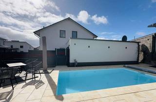 Einfamilienhaus kaufen in Spatzenring 37, 38479 Tappenbeck, Modernes, energieeffizientes Einfamilienhaus inkl. Salzwasserpool, Einbauküche&Garage bei Wolfsburg!