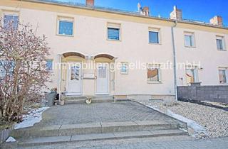 Haus kaufen in 06766 Bitterfeld-Wolfen, Reihenmittelhaus mit Garage als Teil einer WEG in Bitterfeld-Wolfen OT Wolfen