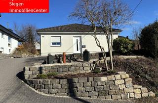 Haus kaufen in 57555 Mudersbach, Neuwertiger Walmdachbungalow mit Apartment und Doppelgarage in Mudersbach