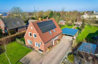 Einfamilienhaus kaufen in 26434 Wangerland, Renoviertes Einfamilienhaus mit PV-Anlage, Kaminofen und 1.362 m² Grundstück!