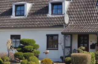 Haus kaufen in 24837 Schleswig, Gemütliches modernisiertes Reihenmittelhaus auf kleinen Grundstück in ruhiger Wohnlage