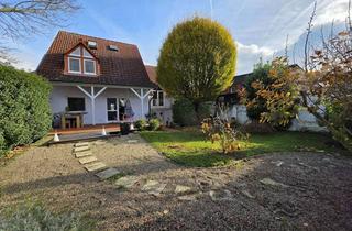 Haus kaufen in 61137 Schöneck, Zwei Häuser – ein Grundstück – vielseitiges Wohnen in Schöneck-Büdesheim!