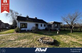 Haus kaufen in 26529 Osteel, Ebenerdiges Wohnhaus mit Anbau und großem Garten in Osteel