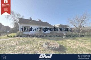 Haus kaufen in 26529 Osteel, Ebenerdiges Wohnhaus mit Anbau und großem Garten in Osteel