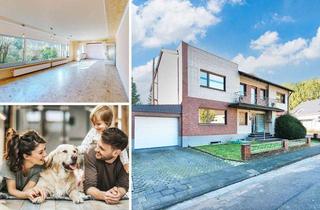 Wohnung kaufen in 52249 Eschweiler, PHI AACHEN - Top gepflegte Erdgeschosswohnung mit Garten und drei Garagen!