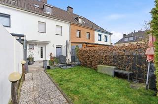 Einfamilienhaus kaufen in Gneisenaustr 57, 41539 Dormagen, Modernisiert & teilsaniert: Einfamilienhaus mit zwei Garagen - ideal für Familien