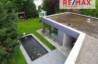 Villa kaufen in 67117 Limburgerhof, Außergewöhnliche Villa mit traumhaftem Garten in begehrter Lage von Limburgerhof