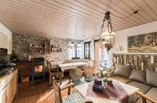 Haus kaufen in 25704 Nordermeldorf, Naturnah wohnen: Bungalow mit Kamin, 2 Bäder & Wintergarten