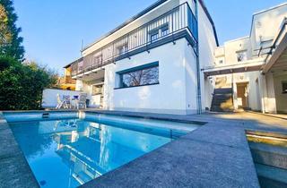 Einfamilienhaus kaufen in 61476 Kronberg, Exklusives Einfamilienhaus mit Pool, großen Sonnenterrassen, Sauna und Garten in bester Taunuslage