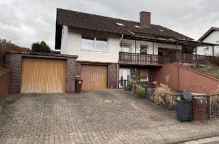 Einfamilienhaus kaufen in 63654 Büdingen, Büdingen - Charmantes Einfamilienhaus in ruhiger Feldrandlage zu verkaufen