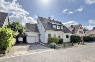 Haus kaufen in 33378 Rheda-Wiedenbrück, Zweifamilienhaus in Rheda – Solide Kapitalanlage oder Mehrgenerationenlösung in ruhiger Lage