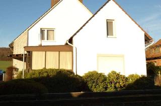 Haus kaufen in 49201 Dissen, Solides Wohnhaus mit Garage und Gartenanteil in ruhiger Siedlungslage von Dissen aTW