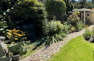Wohnung kaufen in 82194 Gröbenzell, Haus im Haus - Erdgeschosswohnung mit Garten in Gröbenzell