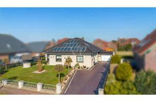 Haus kaufen in 26556 Westerholt, Charmanter Bungalow in zentraler Siedlungslage von Westerholt