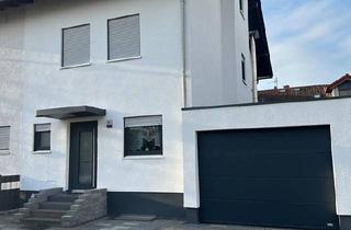 Doppelhaushälfte kaufen in 35619 Braunfels, Braunfels - Modernisierte Doppelhaushälfte mit Sauna, neuem Balkon und Garten