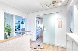 Wohnung kaufen in 72649 Wolfschlugen, Lichtdurchflutete Erdgeschosswohnung mit Garten & Terrasse – Wohnen auf zwei Ebenen