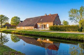 Haus kaufen in 26629 Großefehn, Kleinod zum Wachküssen mit Idylle pur: Fehnhaus direkt am Wasser mit Scheune, Garage & großem Garten