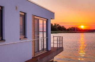 Haus kaufen in Körkwitzer Weg 15, 18311 Ribnitz-Damgarten, Ferienhaus auf dem Wasser im Saaler Bodden mit PKW Stellplatz