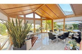 Einfamilienhaus kaufen in 97505 Geldersheim, Geldersheim - Großzügiges lichtdurchflutetes Splitlevel-Einfamilienhaus