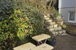 Wohnung kaufen in 61118 Bad Vilbel, Traumwohnung mit idyllischem Garten