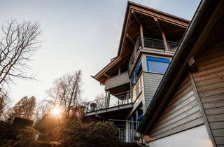 Haus kaufen in 61389 Schmitten, Manche Architektur baut nicht Räume. Sie baut Gefühl.