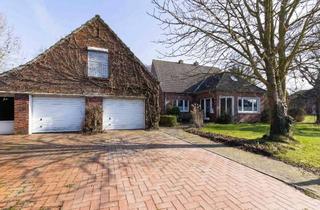 Einfamilienhaus kaufen in 26736 Krummhörn, Einfamilienhaus mit Potenzial, zwei Garagen und separater Einliegerwohnung