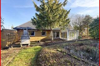 Haus kaufen in 24837 Schleswig, Raum für Ihre Wohnträume - Sanierungsbedürftiger Bungalow mit Wintergarten in bevorzugter Lage
