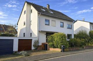 Mehrfamilienhaus kaufen in 65830 Kriftel, METZ IMMOBILIEN - Mehrfamilienhaus mit freier Erdgeschosswohnung und Garten