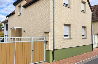 Einfamilienhaus kaufen in 64319 Pfungstadt, Ein Zuhause für Ihre Ideen: Familienhaus mit großem Garten und viel Potenzial in Pfungstadt