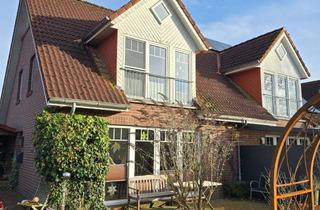 Doppelhaushälfte kaufen in 26605 Aurich, Wunderschöne Doppelhaushälfte mit Wohlfühlcharakter, Kamin und Garten