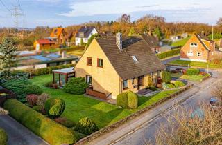 Haus kaufen in 24976 Handewitt, Gepflegtes EFH mit moderner ELW auf 111qm Wfl.! WiGa, Terrasse, Balkon, Garage, Teilkeller & Garten!