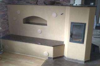 Einfamilienhaus kaufen in 30655 Groß Buchholz, Ebenerdiges Bungalow-Reiheneinfamilienhaus in Hannover-Groß-Buchholz mit effizienten Grundofen