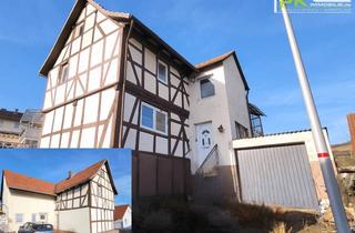 Einfamilienhaus kaufen in 36214 Nentershausen, Viel Platz, viel Potenzial: 7-Zimmer-Einfamilienhaus in 36214 Nentershausen mit Garage und Kaminofen